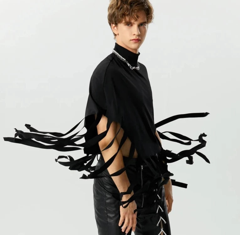 Thique Tasseled Capelet